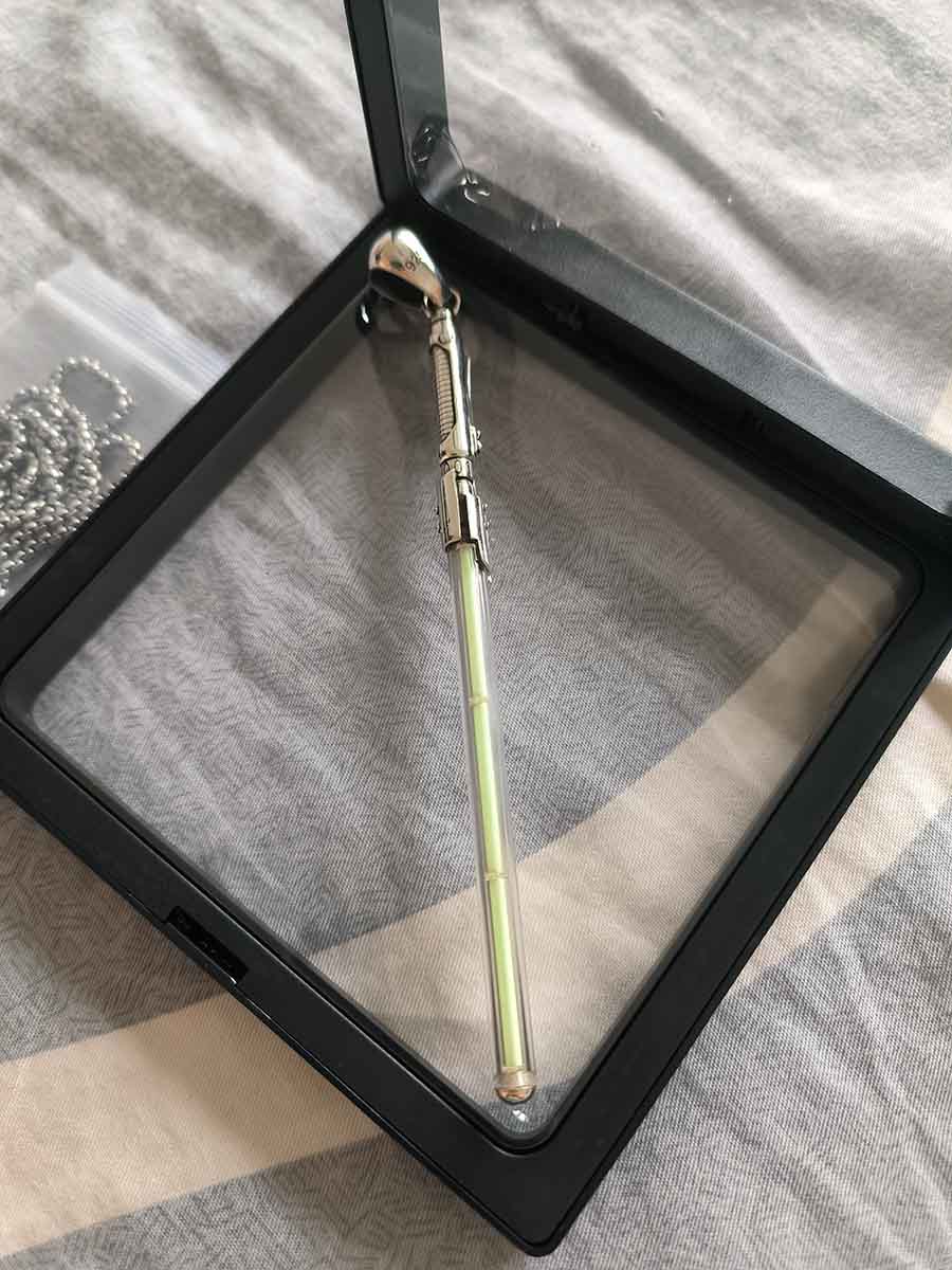 Hand-Carved Mandalorian Lightsaber Tritium Necklace